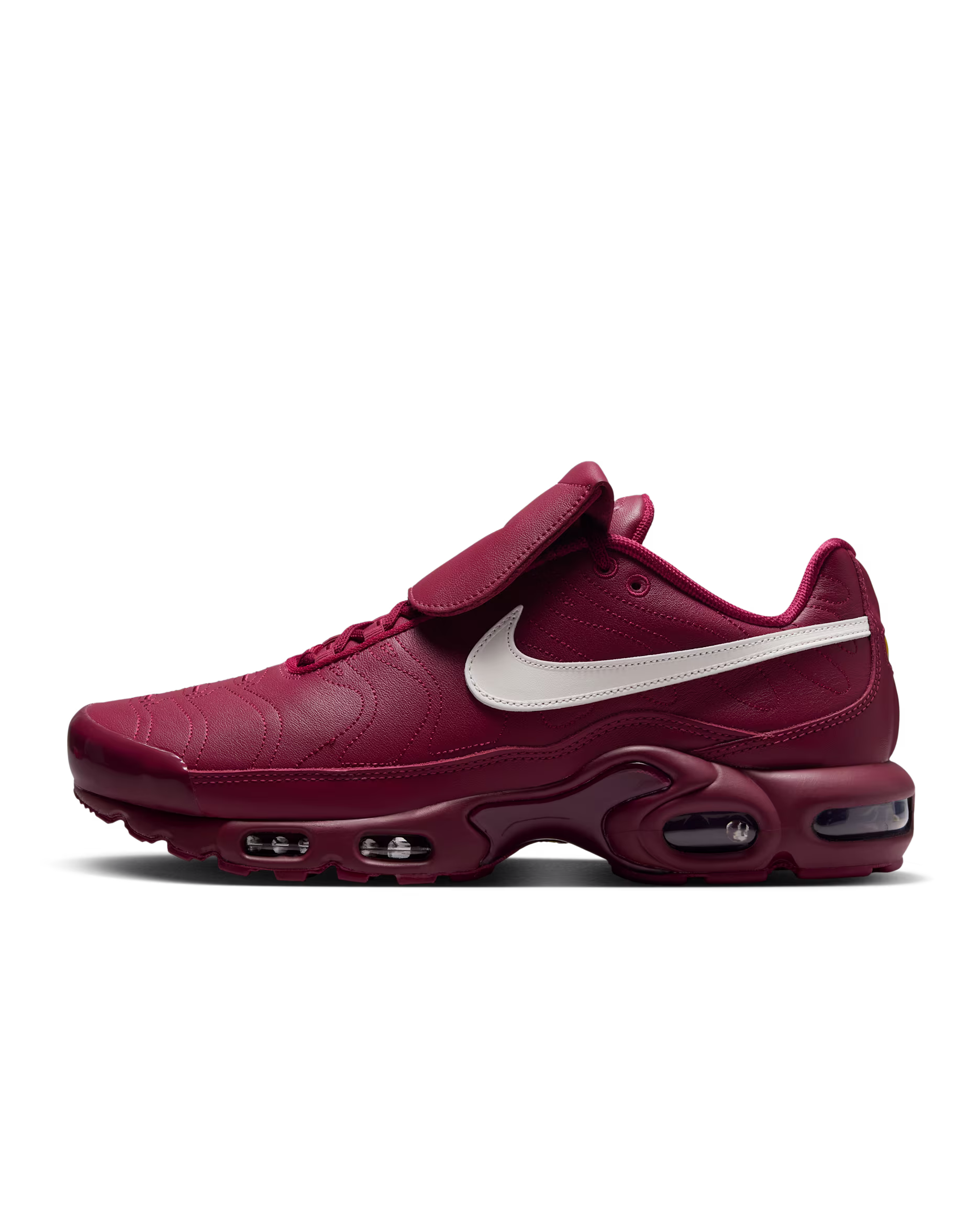 Dark high‑top shoe with laces